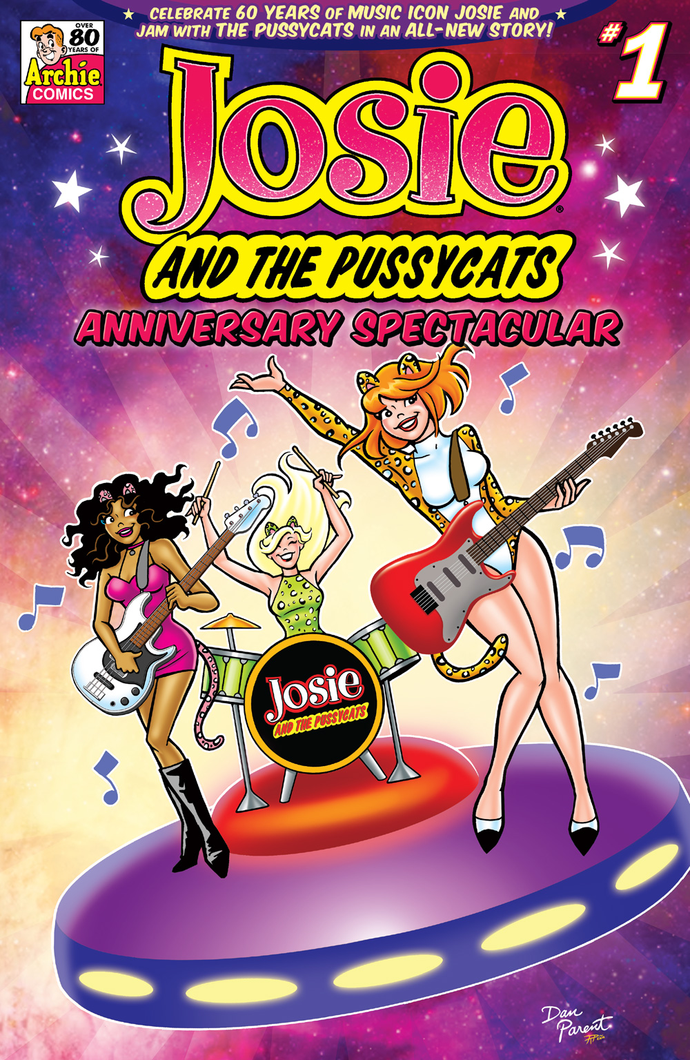Cover of JOSIE AND THE PUSSYCATS ANNIVERSARY SPECTACULAR. The band plays their instruments on top of a flying saucer against an abstract background.