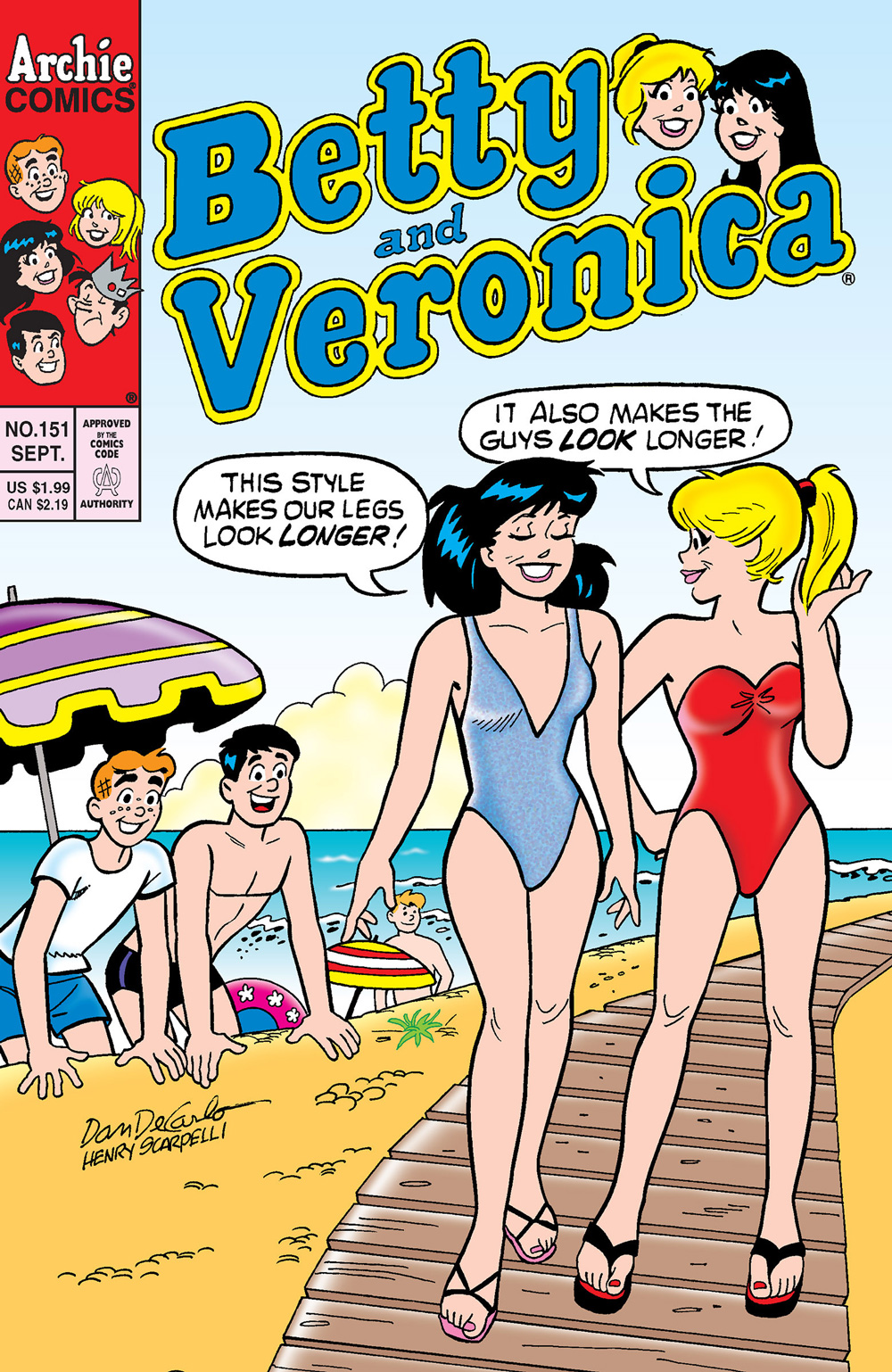 Betty and Veronica are on the beach in swimsuits while Archie and Reggie look on, excited to see them.