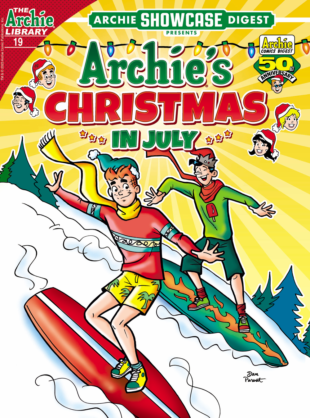 Archie and Jughead are wearing Christmas-themed summer wear, including shorts, Santa hats, and ugly Christmas sweaters. They are snowboarding down a slope, smiling. 