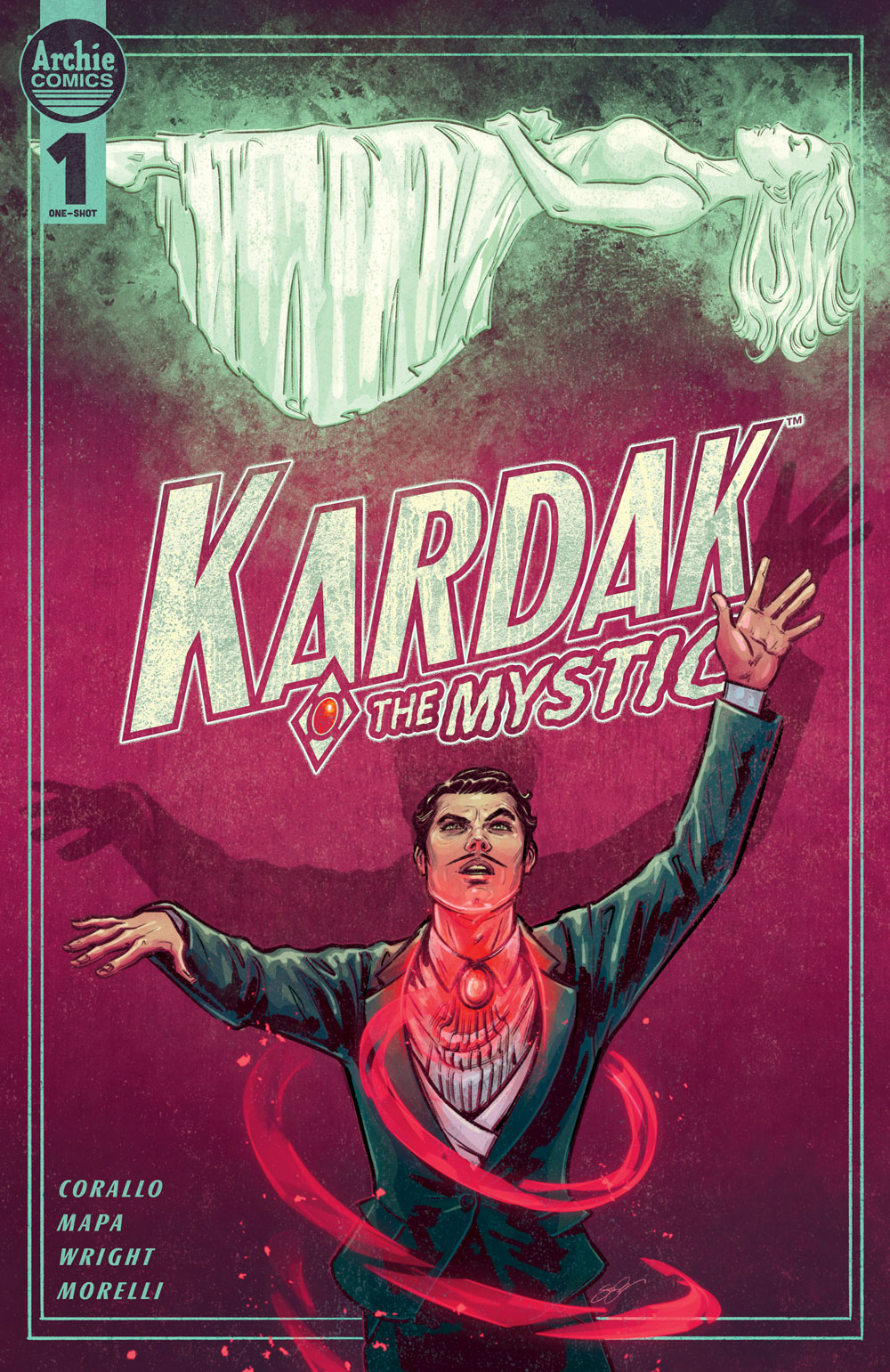Kardak, an older slender white main with dark hair and a gray streak, is dressed and performing magic on stage. He wears a glowing ruby pendant around his neck which is emitting swirls of red energy. His hands are outsretched and a glowing green girl is levitating above him. 