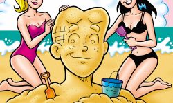 Betty and Veronica are in swimsuits on the beach, smiling. They're building a sand sculpture of Archie's face.