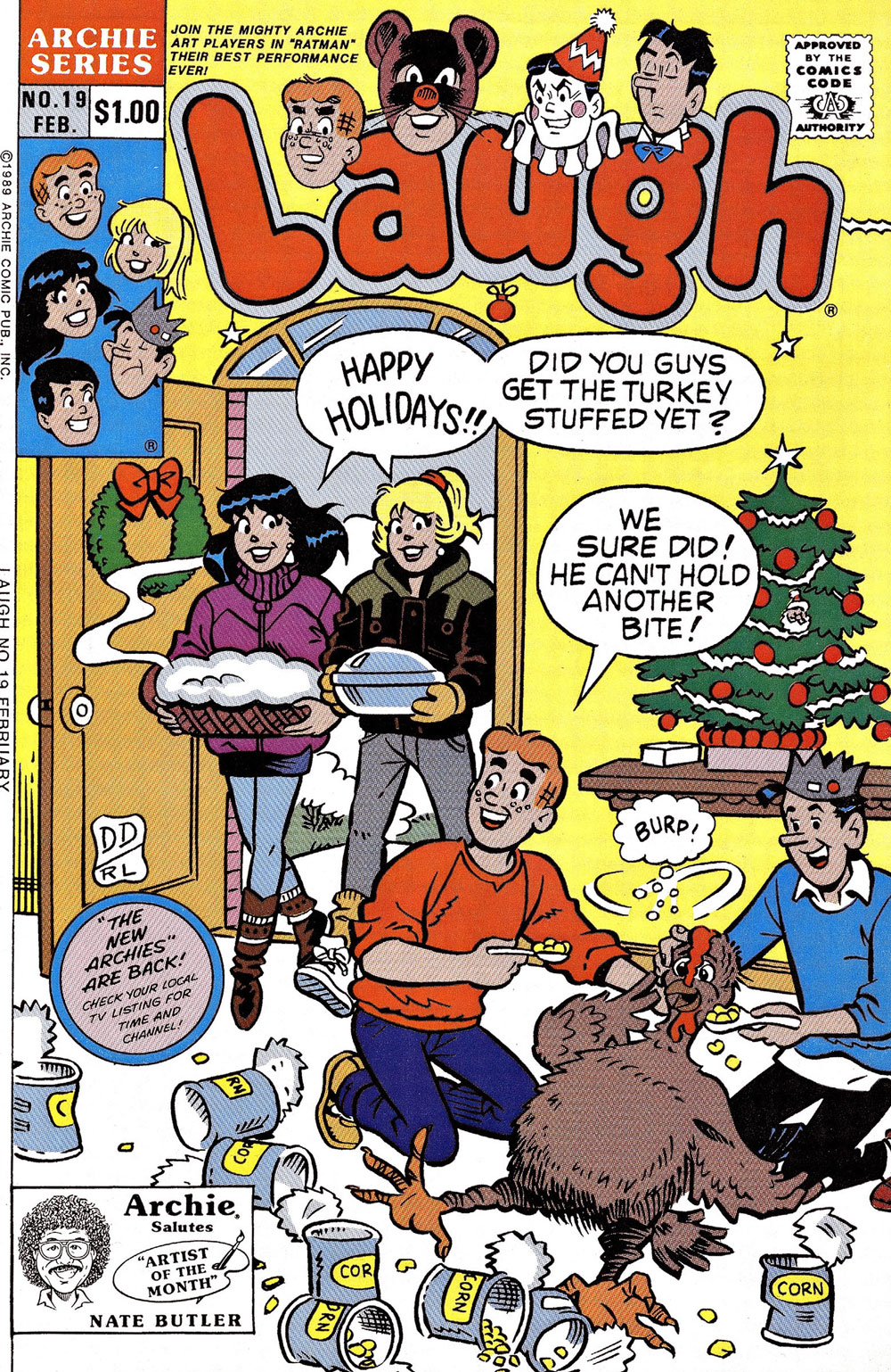 Cover of LAUGH #19. Betty and Veronica walk into Archie's house each holidng a plate of food, saying happy holidays and asking if they stuffed the turkey yet. Archie and Jughead are feeding a living turkey under the Christmas tree and Archie says they did -- the turkey can't eat another bite.