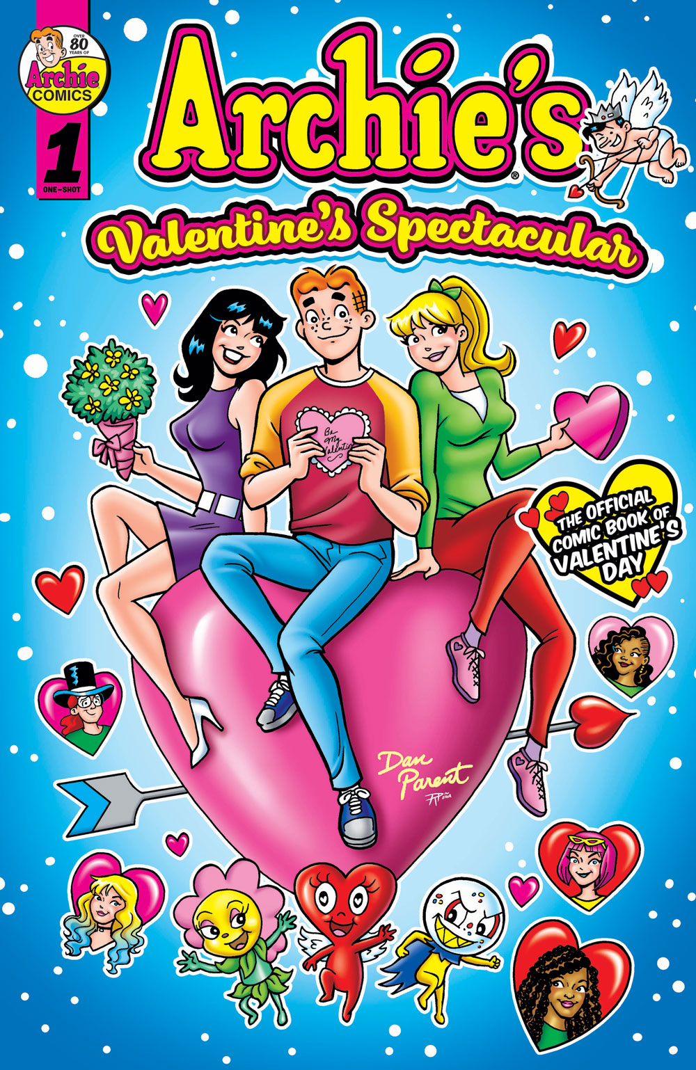 Cover of ARCHIE'S VALENTINE'S SPECTACULAR #1. Archie, Betty, and Veronica sit on top of a giant pink heart that floats above a blue background. Betty and Archie each hold a heart while Veronica holds a bouquet of flowers. Surrounding the trio is an assortment of floating character heads in stylized hearts, including Cassie Cloud, Randolph, Eliza, Stacy, Josie, and the spirits of Valentine's Day: Flowers, Hearts, and Candy.